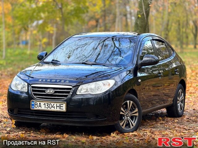 Черный Хендай Элантра, объемом двигателя 1.6 л и пробегом 223 тыс. км за 5999 $, фото 2 на Automoto.ua