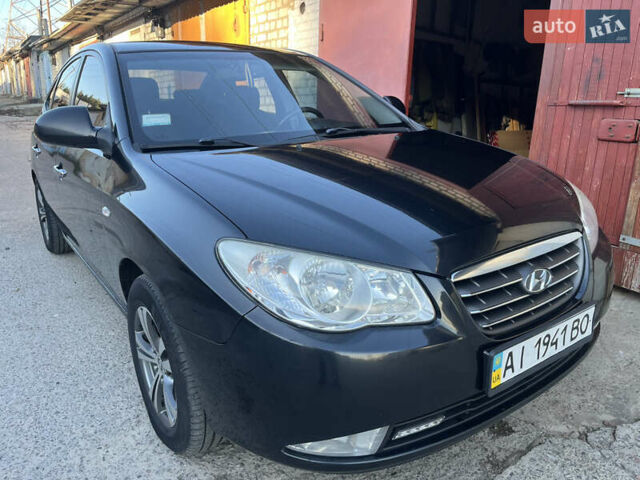 Черный Хендай Элантра, объемом двигателя 1.59 л и пробегом 240 тыс. км за 6257 $, фото 1 на Automoto.ua