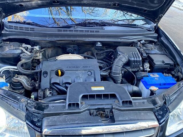 Черный Хендай Элантра, объемом двигателя 1.6 л и пробегом 158 тыс. км за 6800 $, фото 9 на Automoto.ua