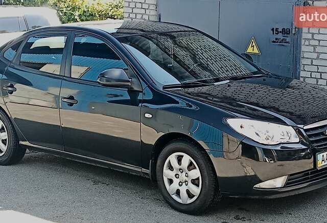 Черный Хендай Элантра, объемом двигателя 1.59 л и пробегом 184 тыс. км за 4975 $, фото 1 на Automoto.ua