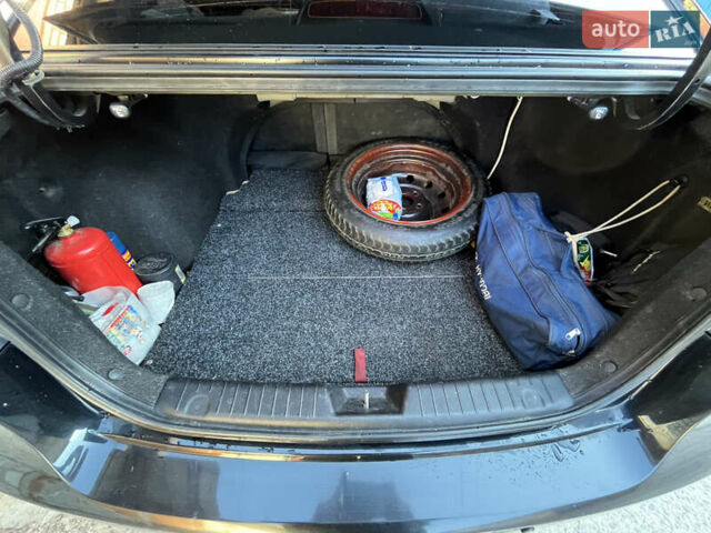 Черный Хендай Элантра, объемом двигателя 1.59 л и пробегом 240 тыс. км за 6257 $, фото 12 на Automoto.ua