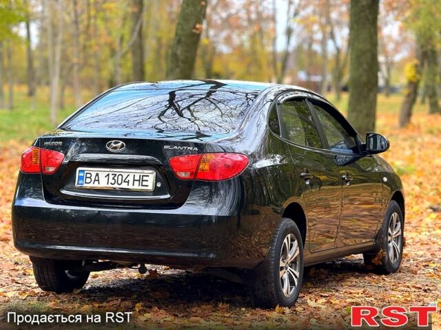 Черный Хендай Элантра, объемом двигателя 1.6 л и пробегом 223 тыс. км за 5999 $, фото 3 на Automoto.ua