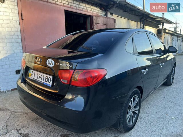 Черный Хендай Элантра, объемом двигателя 1.59 л и пробегом 240 тыс. км за 6257 $, фото 3 на Automoto.ua