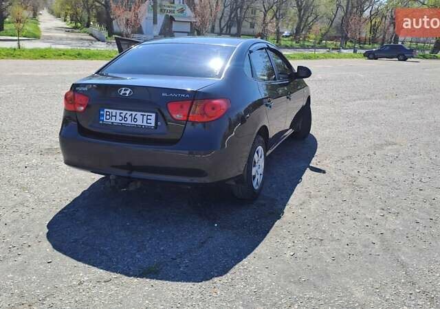 Черный Хендай Элантра, объемом двигателя 1.59 л и пробегом 255 тыс. км за 5000 $, фото 2 на Automoto.ua