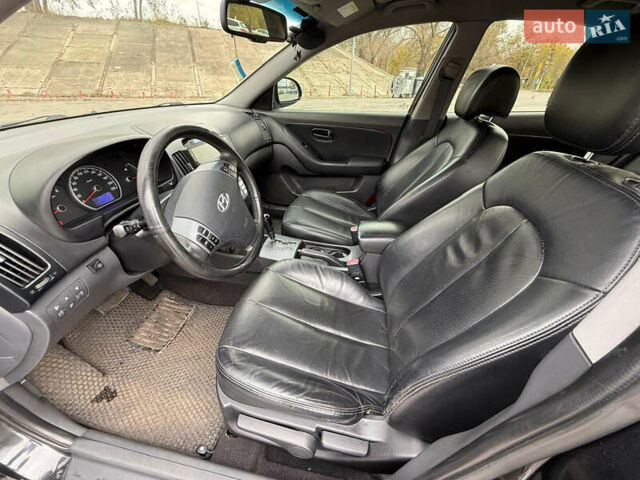 Чорний Хендай Елантра, об'ємом двигуна 2 л та пробігом 240 тис. км за 7850 $, фото 12 на Automoto.ua