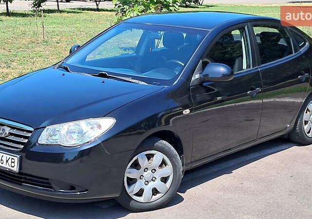 Черный Хендай Элантра, объемом двигателя 1.6 л и пробегом 250 тыс. км за 7000 $, фото 6 на Automoto.ua