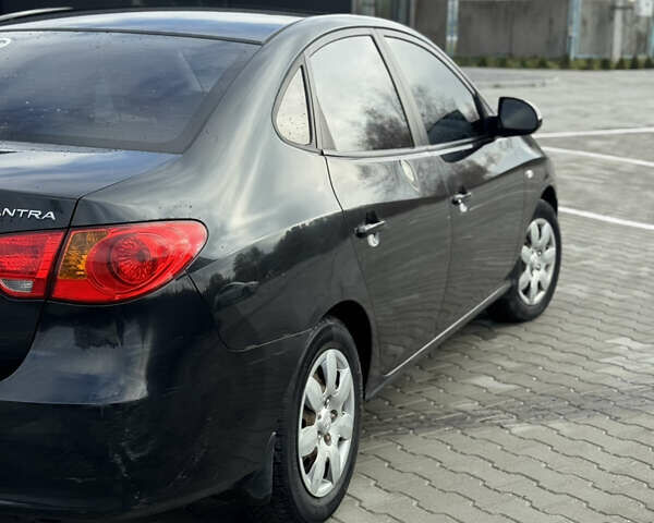 Чорний Хендай Елантра, об'ємом двигуна 1.59 л та пробігом 188 тис. км за 4199 $, фото 4 на Automoto.ua