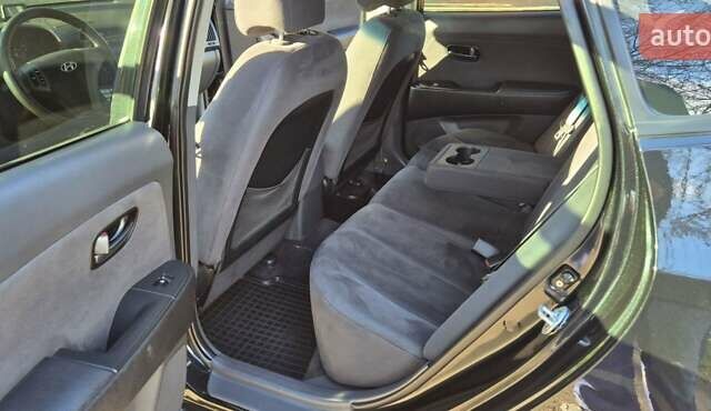 Черный Хендай Элантра, объемом двигателя 1.59 л и пробегом 95 тыс. км за 7200 $, фото 22 на Automoto.ua
