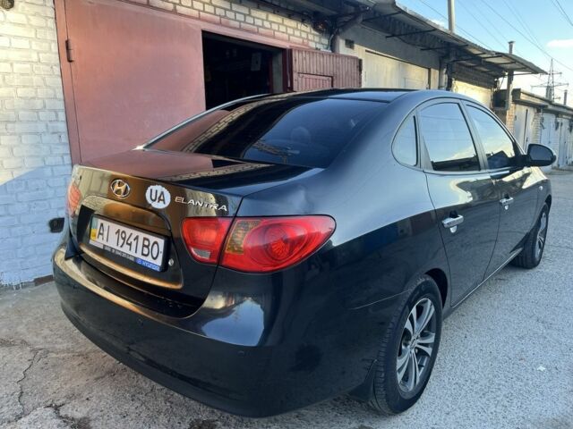 Черный Хендай Элантра, объемом двигателя 1.6 л и пробегом 240 тыс. км за 6411 $, фото 4 на Automoto.ua