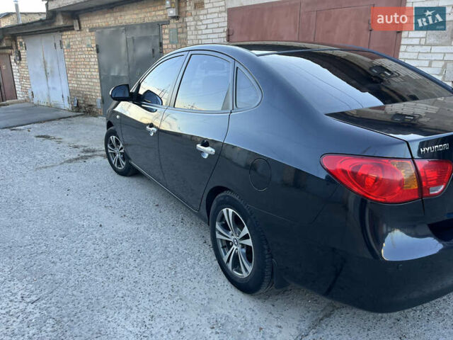 Черный Хендай Элантра, объемом двигателя 1.59 л и пробегом 240 тыс. км за 6257 $, фото 4 на Automoto.ua