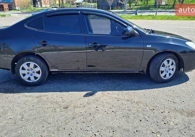 Черный Хендай Элантра, объемом двигателя 1.59 л и пробегом 255 тыс. км за 5000 $, фото 3 на Automoto.ua