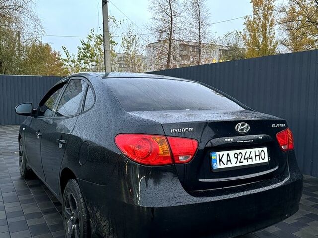 Черный Хендай Элантра, объемом двигателя 1.6 л и пробегом 261 тыс. км за 4799 $, фото 3 на Automoto.ua