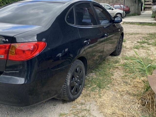 Черный Хендай Элантра, объемом двигателя 1.6 л и пробегом 163 тыс. км за 6700 $, фото 4 на Automoto.ua