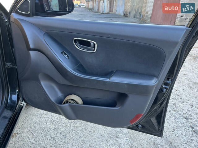 Черный Хендай Элантра, объемом двигателя 1.59 л и пробегом 240 тыс. км за 6257 $, фото 18 на Automoto.ua