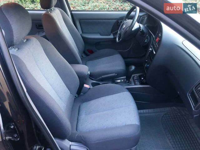 Чорний Хендай Елантра, об'ємом двигуна 1.6 л та пробігом 66 тис. км за 6000 $, фото 10 на Automoto.ua