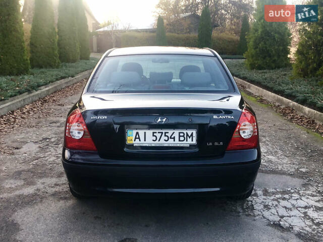 Чорний Хендай Елантра, об'ємом двигуна 1.6 л та пробігом 66 тис. км за 6000 $, фото 3 на Automoto.ua