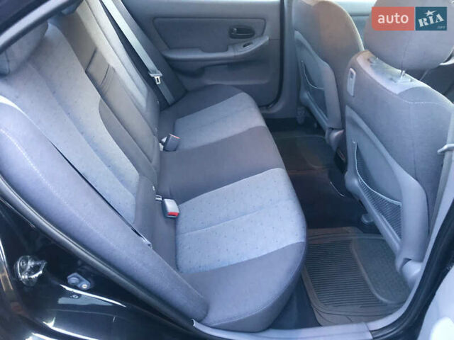 Чорний Хендай Елантра, об'ємом двигуна 1.6 л та пробігом 66 тис. км за 6000 $, фото 9 на Automoto.ua