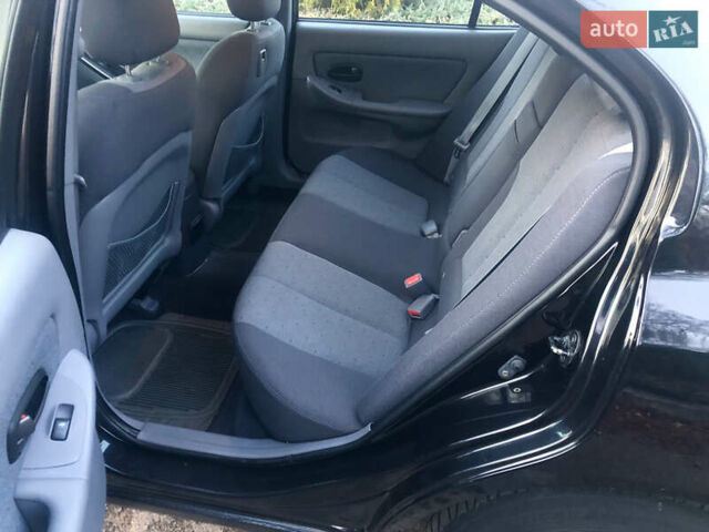Чорний Хендай Елантра, об'ємом двигуна 1.6 л та пробігом 66 тис. км за 6000 $, фото 8 на Automoto.ua