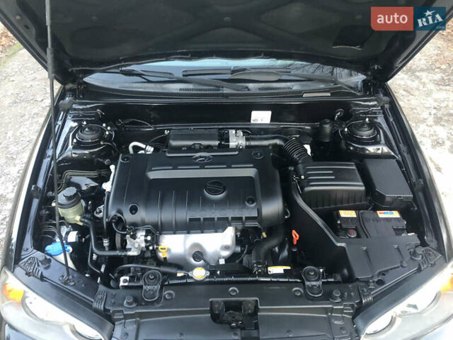 Чорний Хендай Елантра, об'ємом двигуна 1.6 л та пробігом 66 тис. км за 6000 $, фото 11 на Automoto.ua