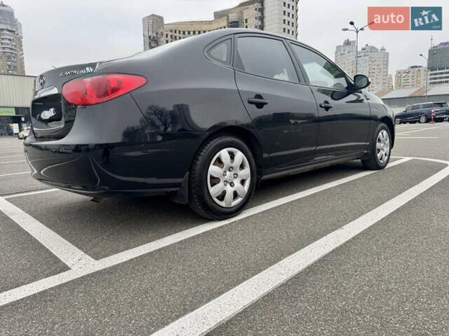 Черный Хендай Элантра, объемом двигателя 1.59 л и пробегом 116 тыс. км за 6700 $, фото 4 на Automoto.ua