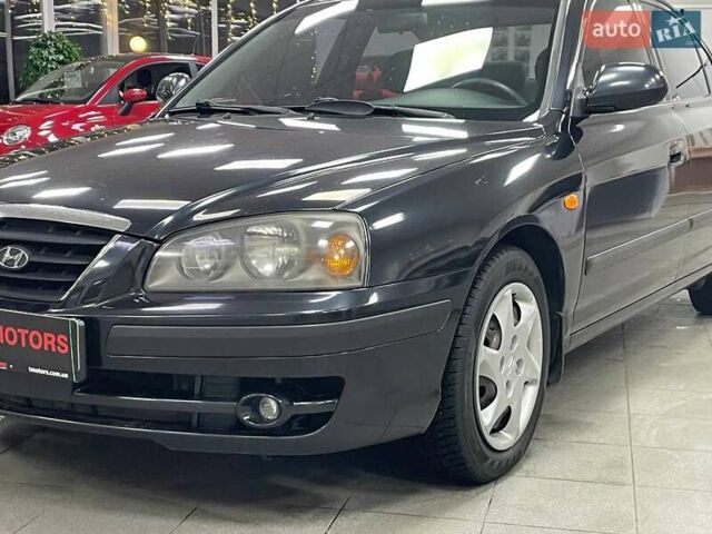 Черный Хендай Элантра, объемом двигателя 1.6 л и пробегом 146 тыс. км за 5890 $, фото 3 на Automoto.ua