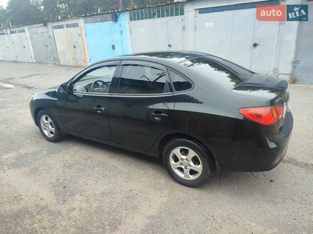 Хендай Элантра 2010 в Киеве на Automoto.ua Черный Хендай Элантра, объемом двигателя 2 л и пробегом 184 тыс. км за 10300 $, фото 4 на Automoto.ua