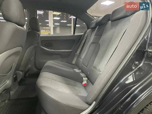 Черный Хендай Элантра, объемом двигателя 1.6 л и пробегом 146 тыс. км за 5890 $, фото 30 на Automoto.ua