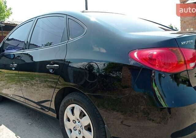 Черный Хендай Элантра, объемом двигателя 1.6 л и пробегом 260 тыс. км за 5300 $, фото 1 на Automoto.ua