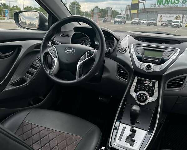 Черный Хендай Элантра, объемом двигателя 1.8 л и пробегом 210 тыс. км за 7599 $, фото 15 на Automoto.ua