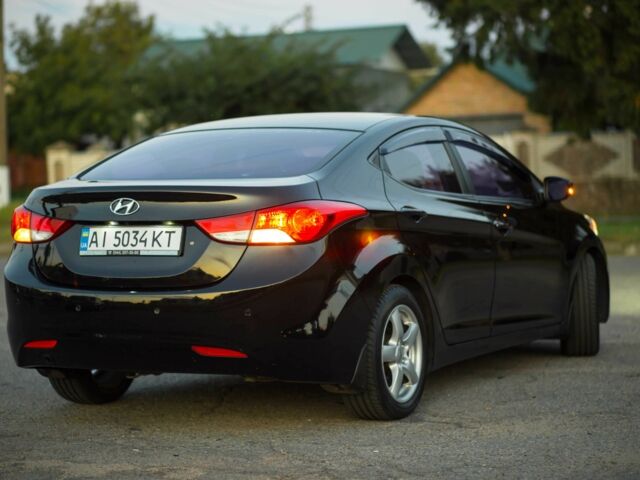 Черный Хендай Элантра, объемом двигателя 1.6 л и пробегом 149 тыс. км за 8350 $, фото 3 на Automoto.ua