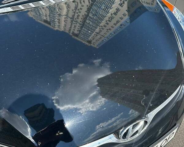 Черный Хендай Элантра, объемом двигателя 1.8 л и пробегом 210 тыс. км за 7599 $, фото 12 на Automoto.ua