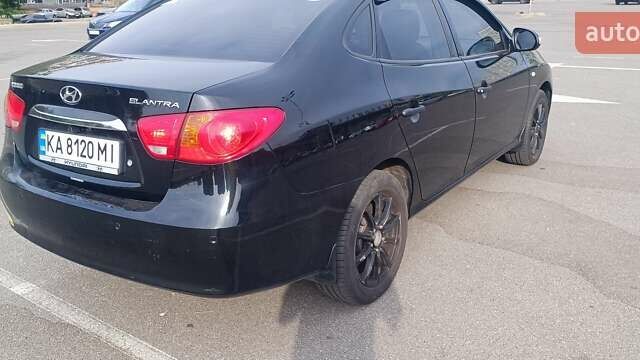 Черный Хендай Элантра, объемом двигателя 1.59 л и пробегом 213 тыс. км за 5500 $, фото 5 на Automoto.ua