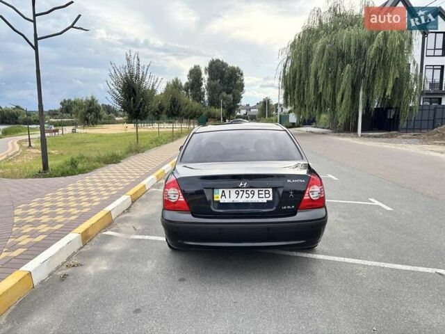 Чорний Хендай Елантра, об'ємом двигуна 1.6 л та пробігом 122 тис. км за 6500 $, фото 5 на Automoto.ua