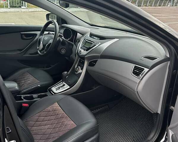 Черный Хендай Элантра, объемом двигателя 1.8 л и пробегом 210 тыс. км за 7599 $, фото 18 на Automoto.ua