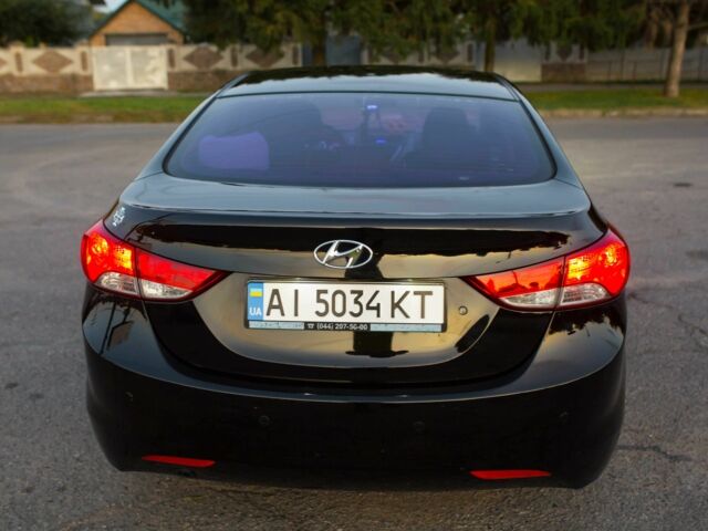 Черный Хендай Элантра, объемом двигателя 1.6 л и пробегом 149 тыс. км за 8350 $, фото 7 на Automoto.ua