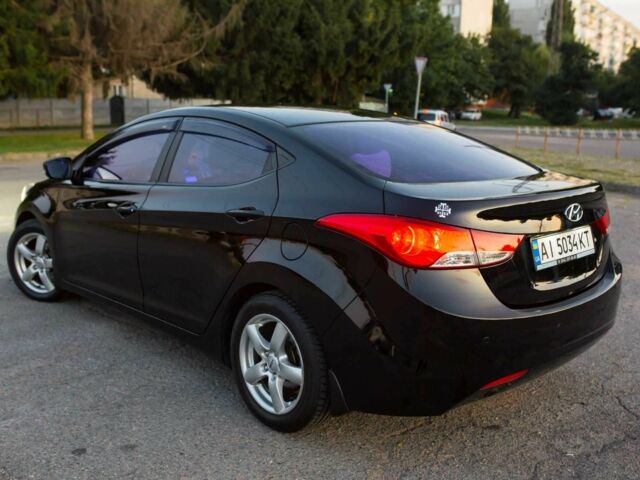 Черный Хендай Элантра, объемом двигателя 1.6 л и пробегом 149 тыс. км за 8350 $, фото 5 на Automoto.ua