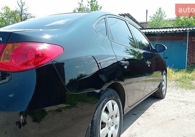 Черный Хендай Элантра, объемом двигателя 1.6 л и пробегом 260 тыс. км за 5300 $, фото 4 на Automoto.ua