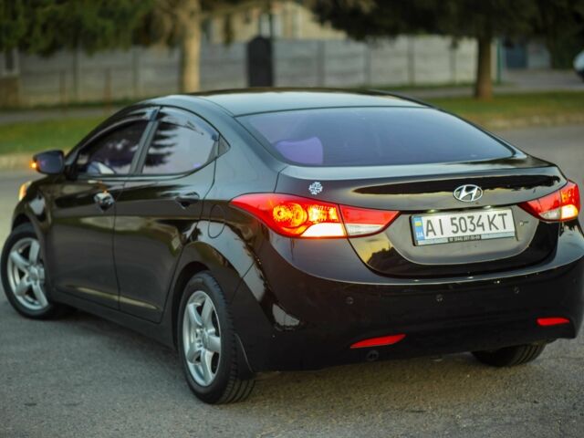Черный Хендай Элантра, объемом двигателя 1.6 л и пробегом 149 тыс. км за 8350 $, фото 1 на Automoto.ua