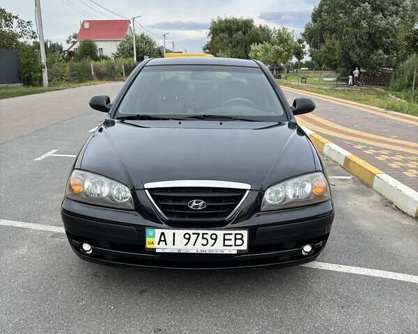 Чорний Хендай Елантра, об'ємом двигуна 1.6 л та пробігом 122 тис. км за 6500 $, фото 1 на Automoto.ua