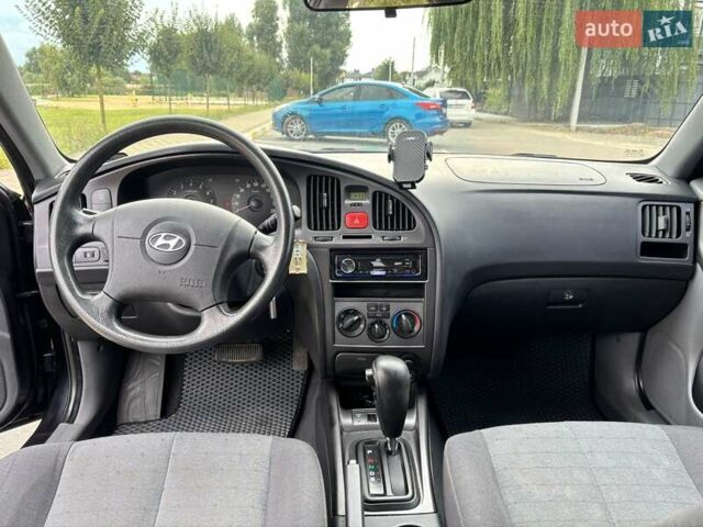 Чорний Хендай Елантра, об'ємом двигуна 1.6 л та пробігом 122 тис. км за 6500 $, фото 8 на Automoto.ua