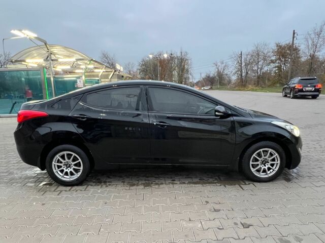 Черный Хендай Элантра, объемом двигателя 1.6 л и пробегом 181 тыс. км за 8800 $, фото 5 на Automoto.ua