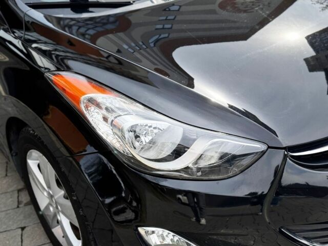 Черный Хендай Элантра, объемом двигателя 1.8 л и пробегом 63 тыс. км за 11000 $, фото 10 на Automoto.ua