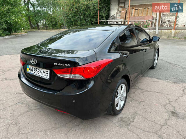 Чорний Хендай Елантра, об'ємом двигуна 1.8 л та пробігом 221 тис. км за 9000 $, фото 1 на Automoto.ua