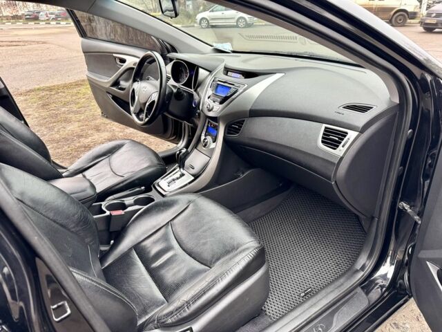 Черный Хендай Элантра, объемом двигателя 1.8 л и пробегом 195 тыс. км за 8990 $, фото 17 на Automoto.ua