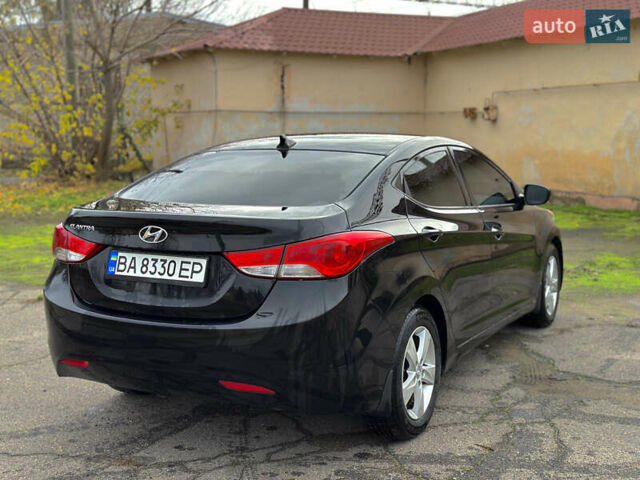 Черный Хендай Элантра, объемом двигателя 1.8 л и пробегом 142 тыс. км за 7900 $, фото 5 на Automoto.ua