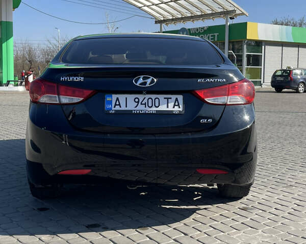 Черный Хендай Элантра, объемом двигателя 1.8 л и пробегом 143 тыс. км за 7900 $, фото 8 на Automoto.ua