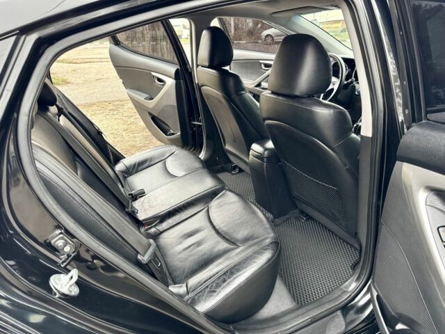 Черный Хендай Элантра, объемом двигателя 1.8 л и пробегом 195 тыс. км за 8990 $, фото 14 на Automoto.ua