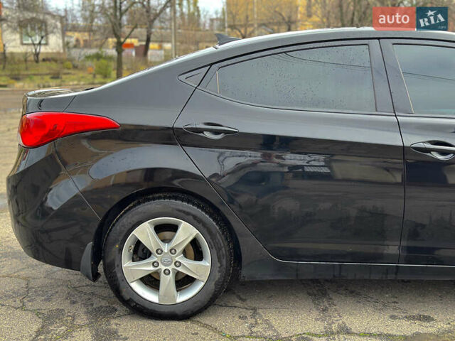Черный Хендай Элантра, объемом двигателя 1.8 л и пробегом 142 тыс. км за 7900 $, фото 6 на Automoto.ua