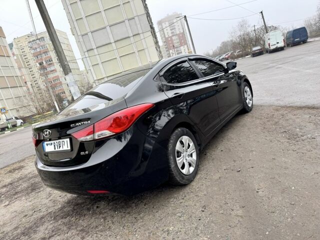 Черный Хендай Элантра, объемом двигателя 1.8 л и пробегом 195 тыс. км за 8990 $, фото 4 на Automoto.ua