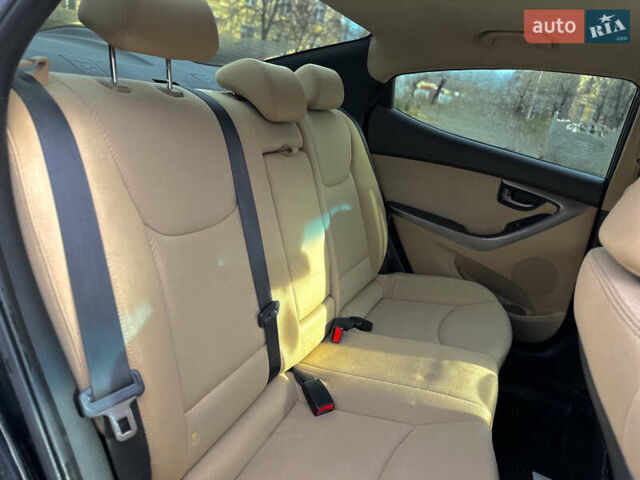 Черный Хендай Элантра, объемом двигателя 1.8 л и пробегом 142 тыс. км за 7900 $, фото 16 на Automoto.ua